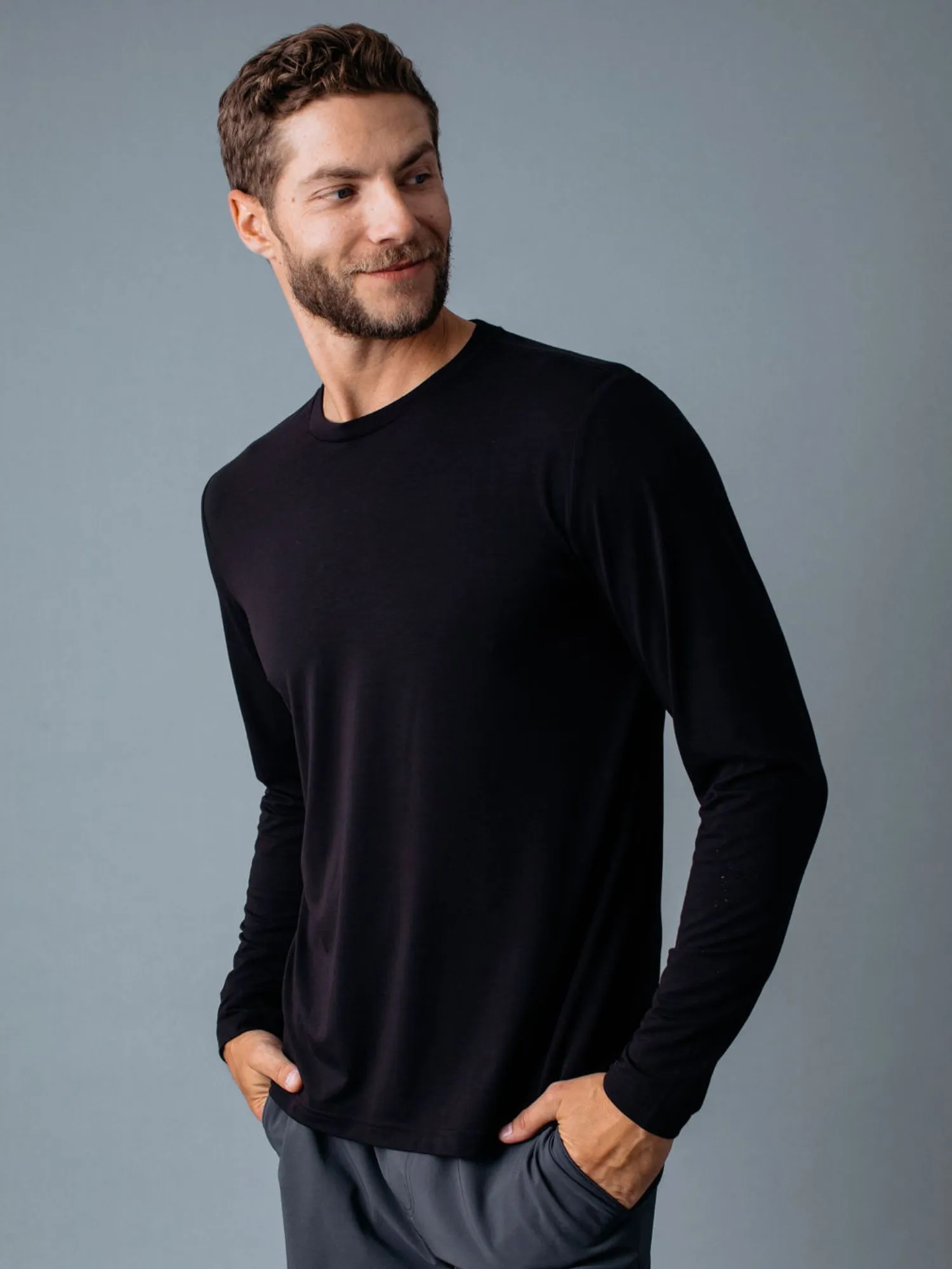Black Performance Long Sleeve Crew Stylish and Fun Pocket Design