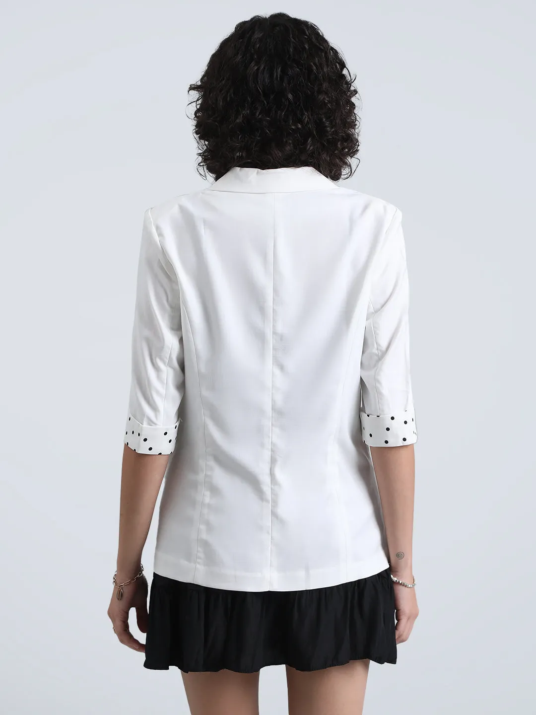 SlimSilhouette Women's Off-White Single-Breasted Blazer with 3/4 Sleeve and Polka Dot Cuff